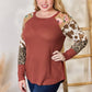 Hailey & Co Full Size Leopard Waffle-Knit Blouse