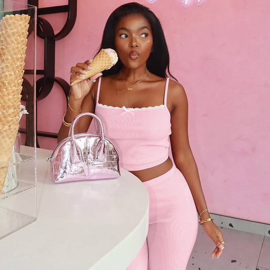 Top de encaje con tirantes finos de estilo europeo y americano, ajustado.