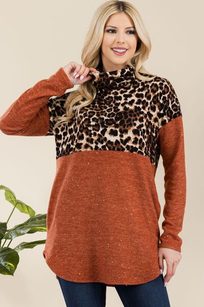 Blusa Celeste de manga larga con cuello alto y estampado de leopardo, dobladillo curvo y talla grande